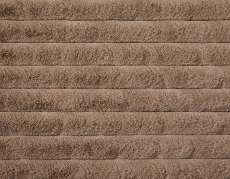 Close-up of brown textured fabric with a subtle pattern