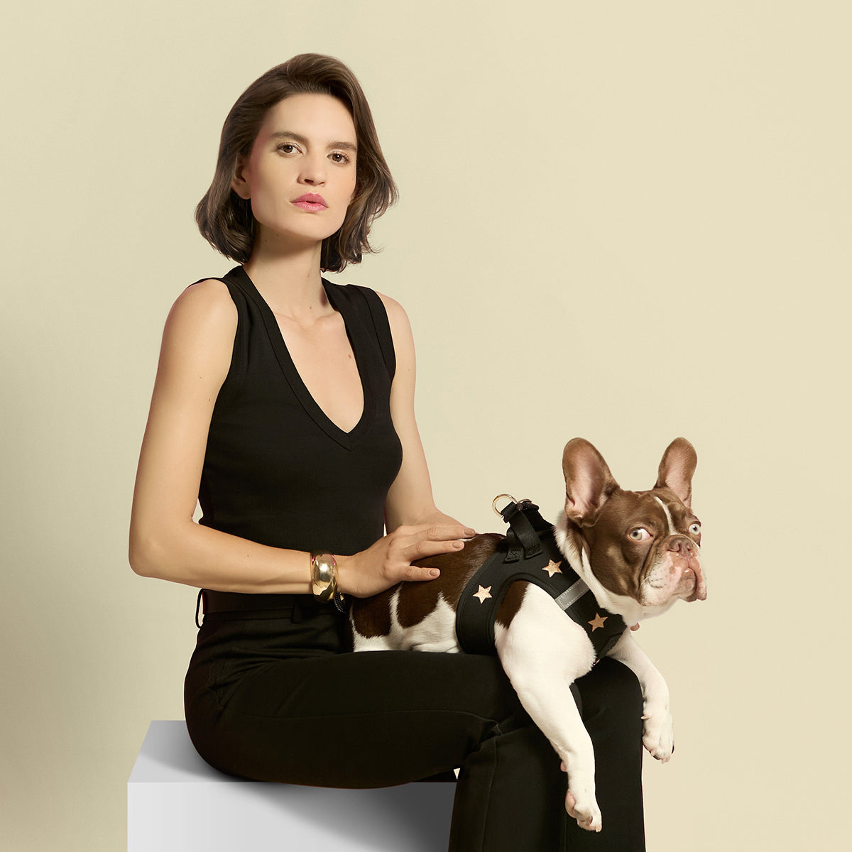 Woman with a French bulldog in the Rockstar harness