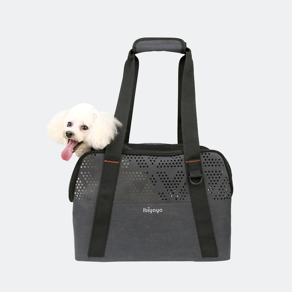 Lightweight ibiyaya gray pet carrier with a small white dog peeking out on a light gray background