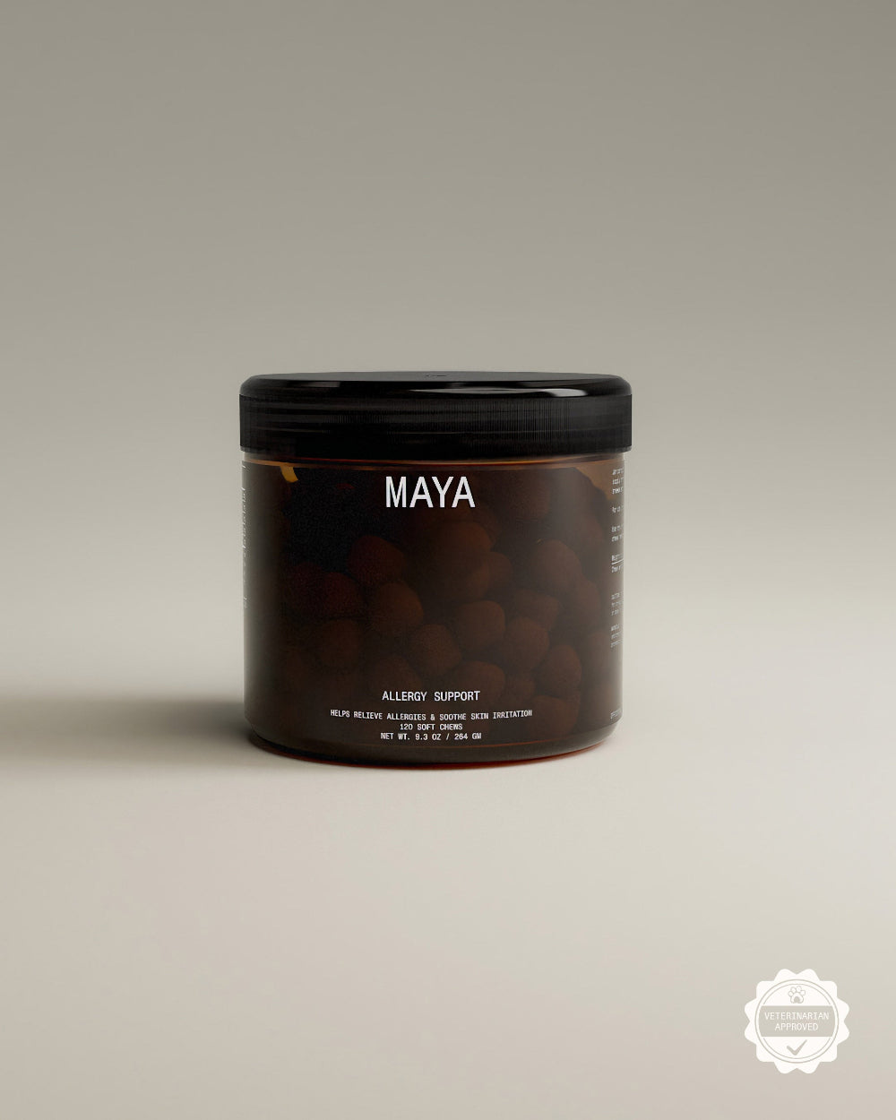 Brown dog supplement jar for allergies with black lid labeled 'Maya' on a beige background