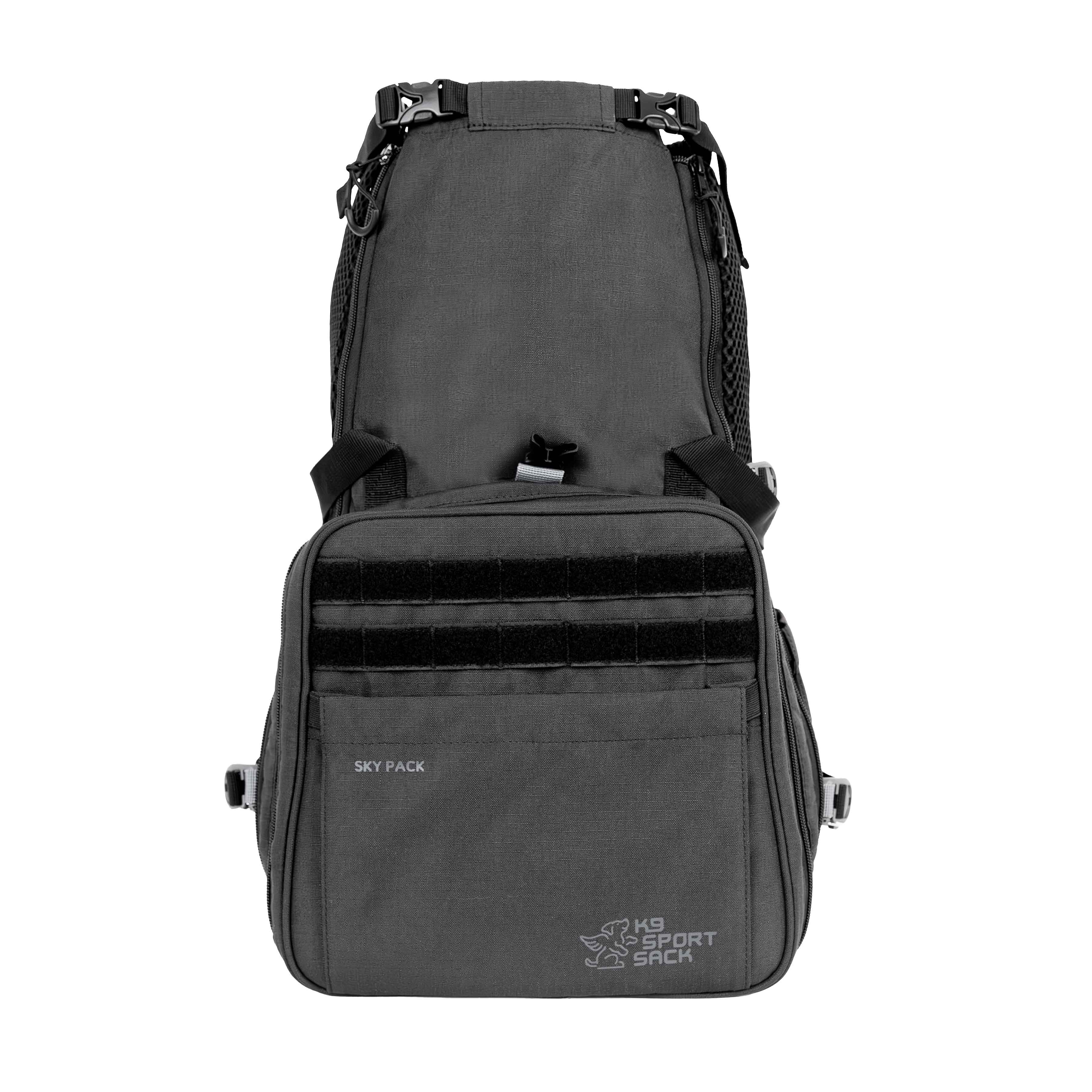 Black K9 Sport Sack dog backpack with multiple straps on a white background
