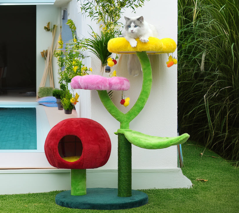 Cat resting on whimsical cat tree in big flowers