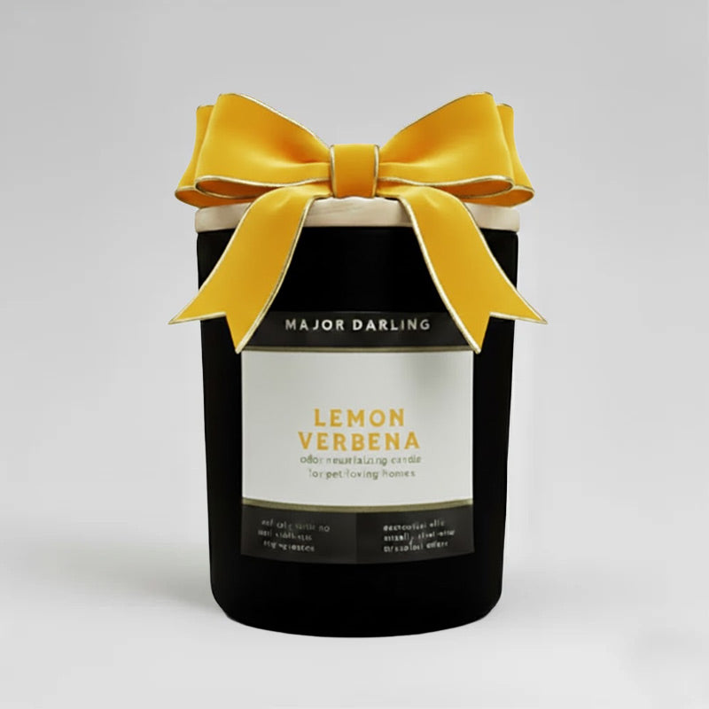 Pet odor candle labeled 'Major Darling Lemon Verbena' with a yellow bow on a light gray background