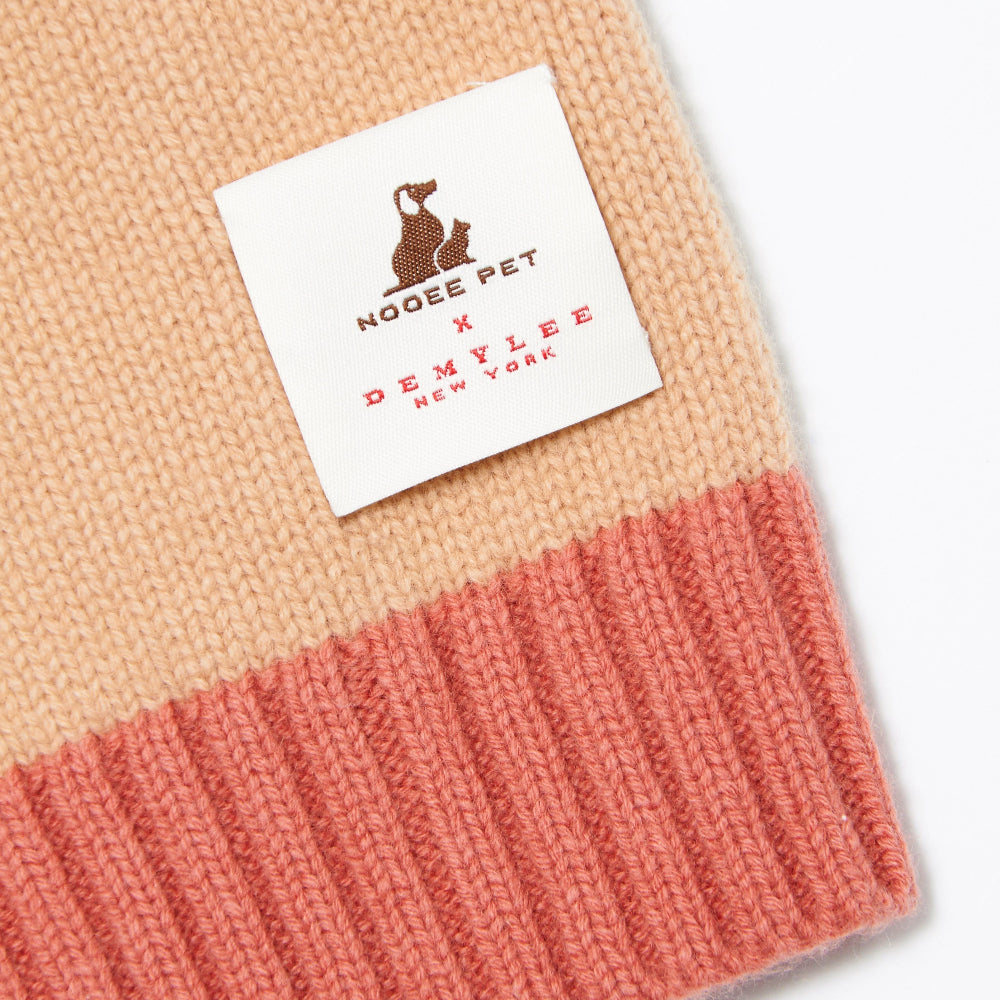 Knitted product with a label featuring 'Nooee Pet' and 'Demylee New York'.