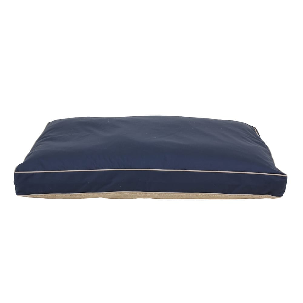 Navy canvas pet bed with beige trim on a white background