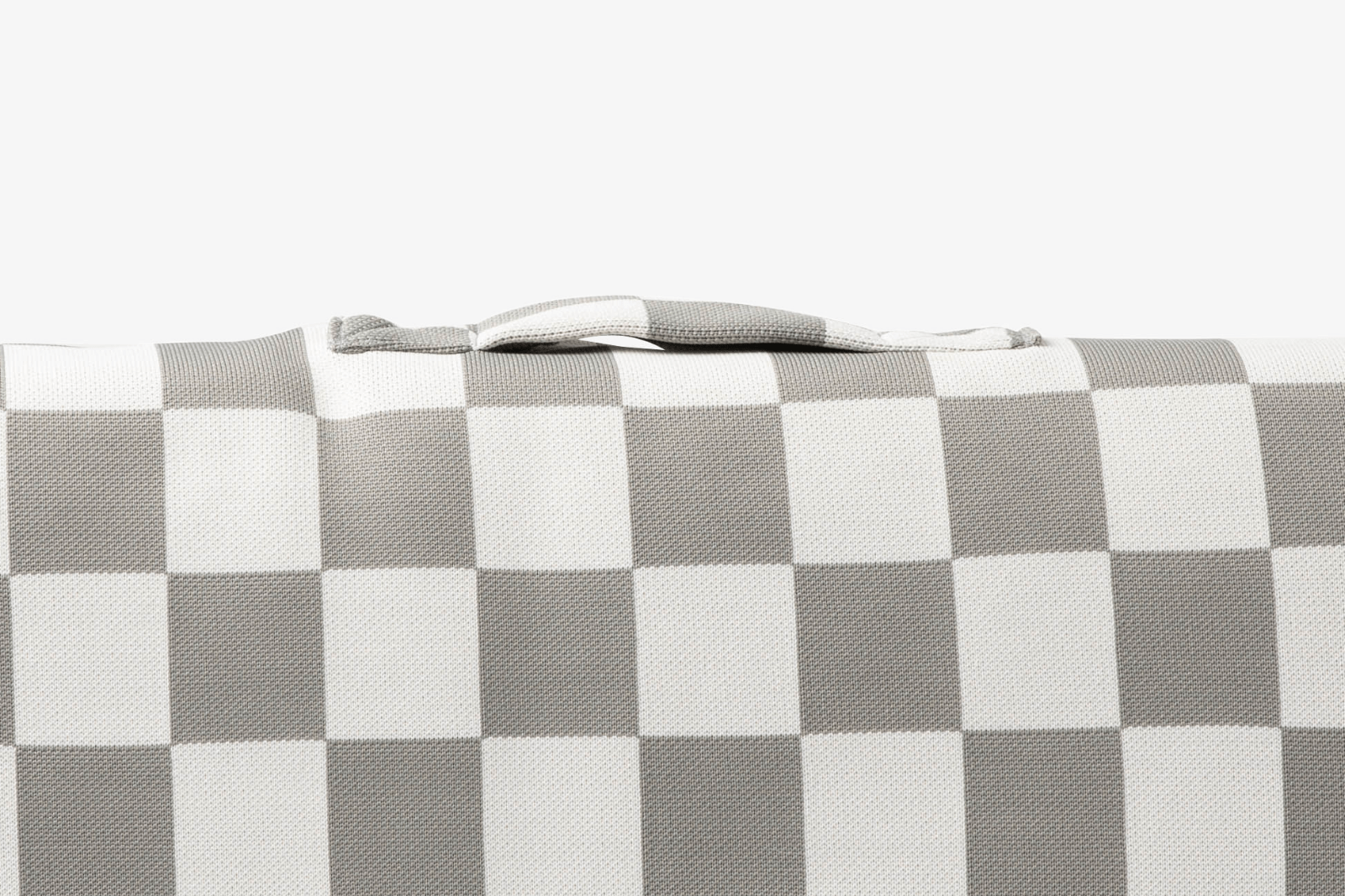 Checkered fabric with gray and white squares on a white background for a dog bed