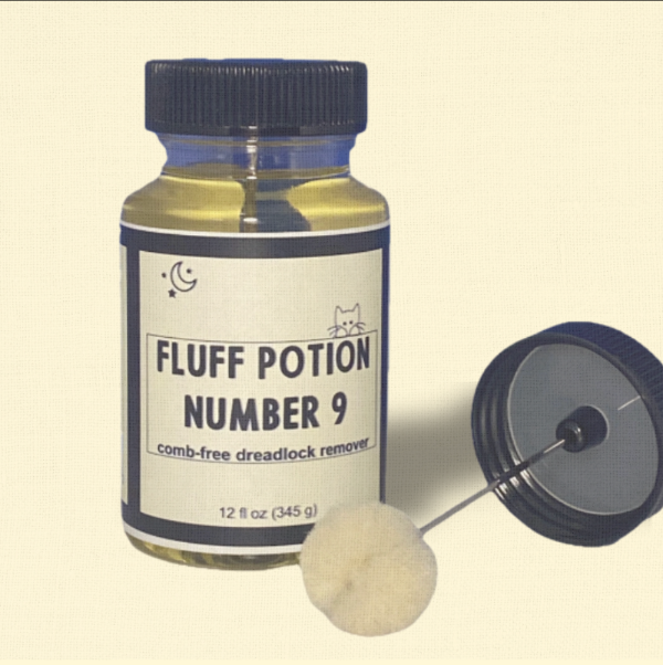 Bottle labeled 'Fluff Potion Number 9' with a applicator on a beige background