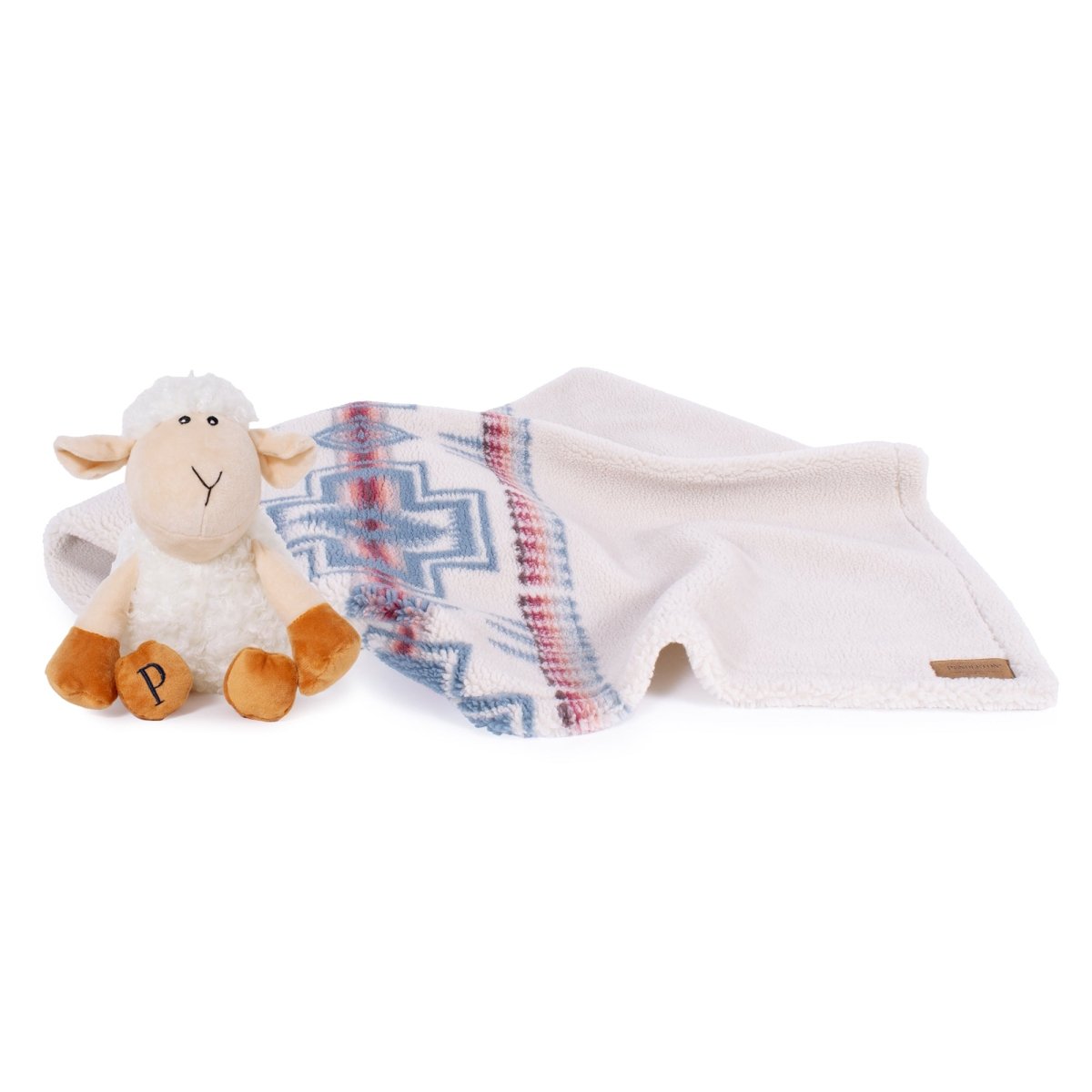 Plush lamb toy with a Pendleton patterned dog blanket on a white background