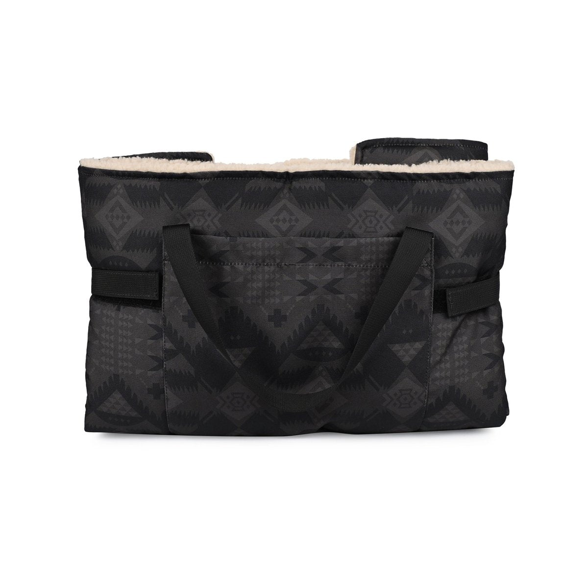 Black quilted bag with geometric pattern on a white background