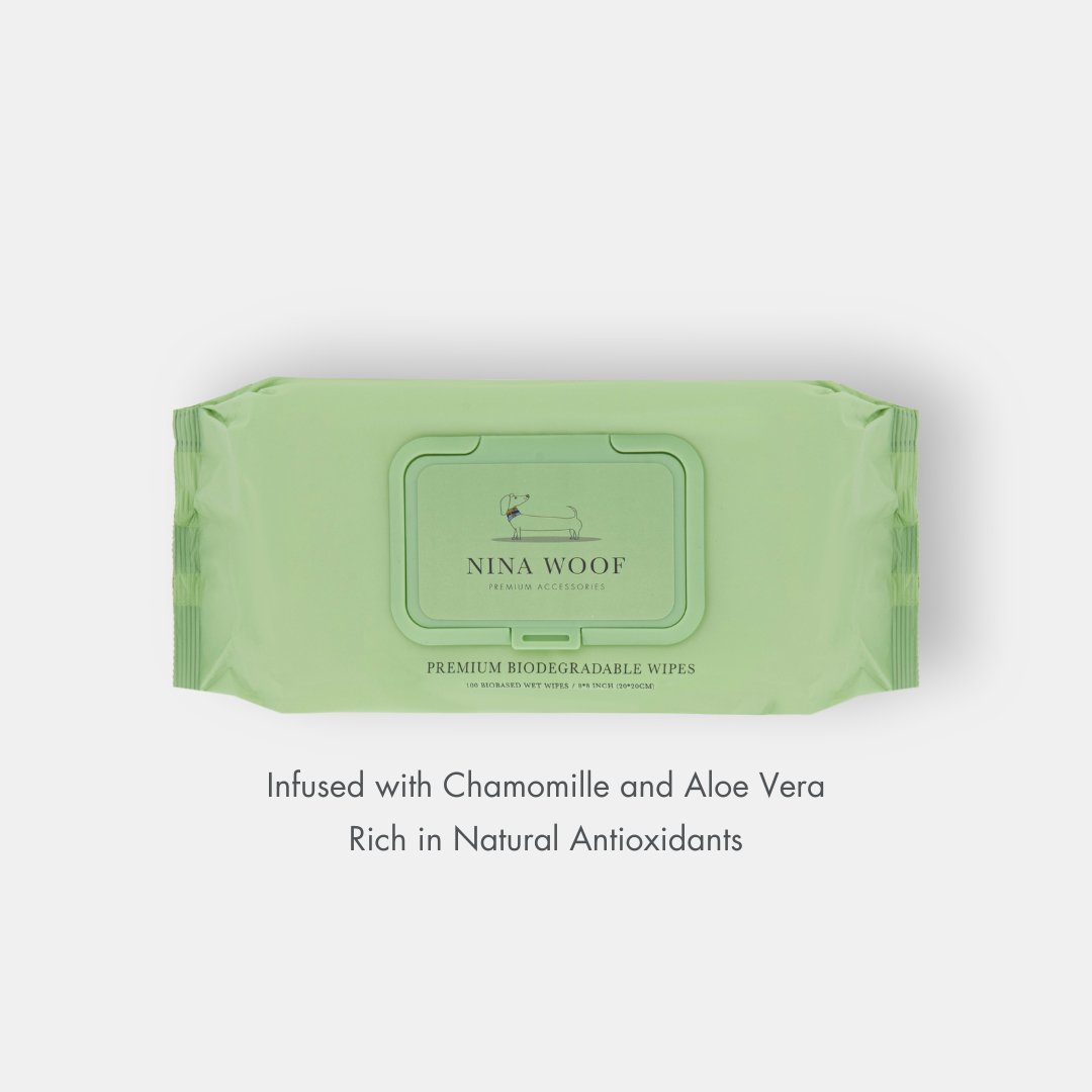 Green package of Nina Woof non-toxic plant based natural dog wipes on a white background