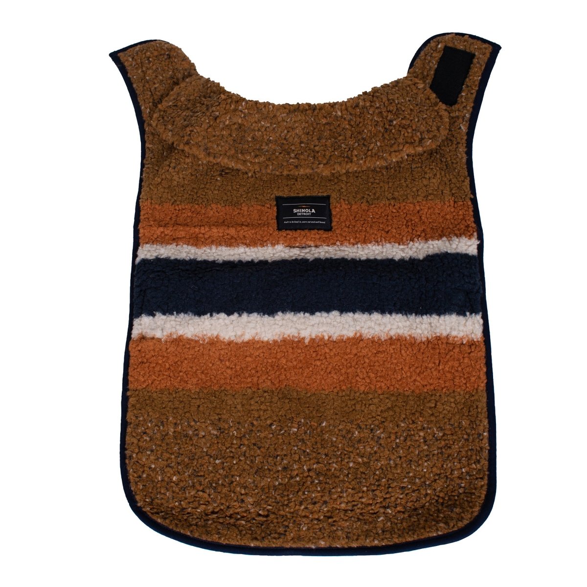 Brown and black striped Shinola dog coat with a brand label on a white background and berber warm fabric