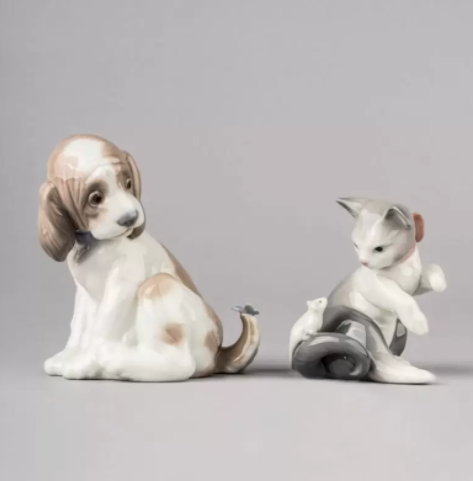 Two porcelain pet figurines from Lladro make the best luxury gift for a dog mom and cat mom for Mother's Day gift.