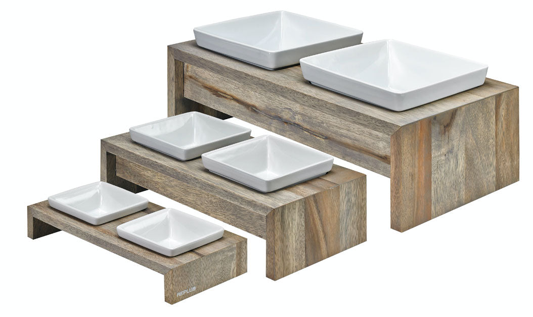 Ceramic bowls on wooden stand for large dogs and small puppies
