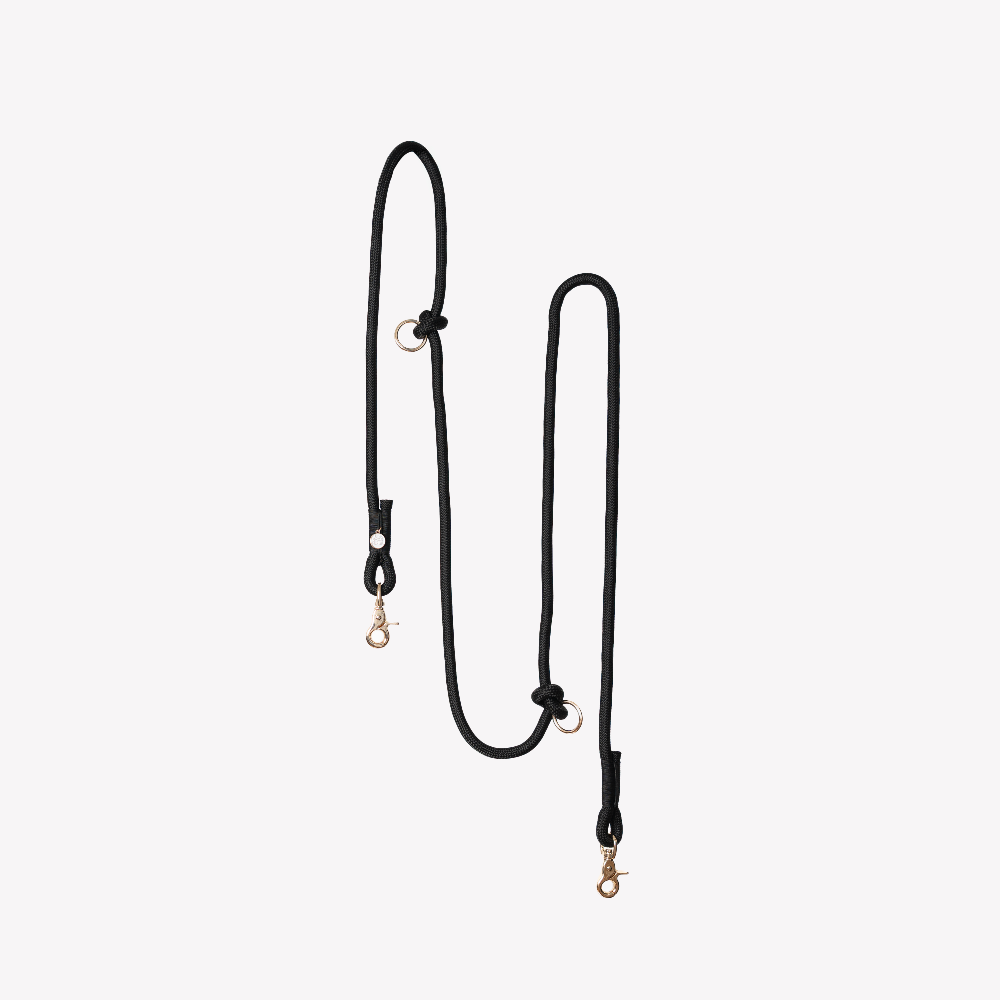 Black lanyard with gold hooks on a white background