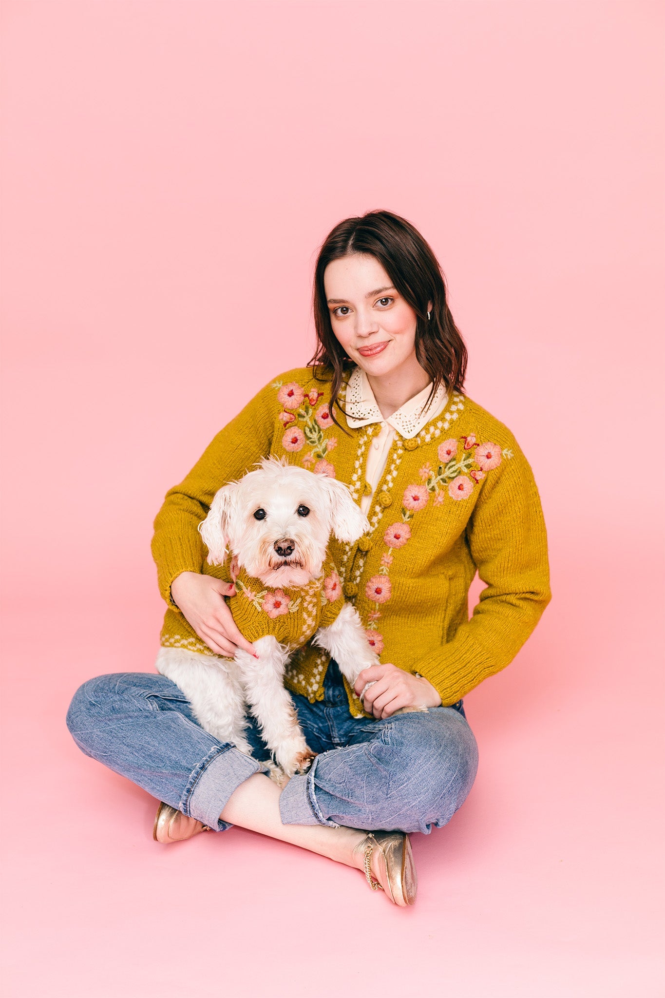 Dog mom with matching dog wool sweater and her dog