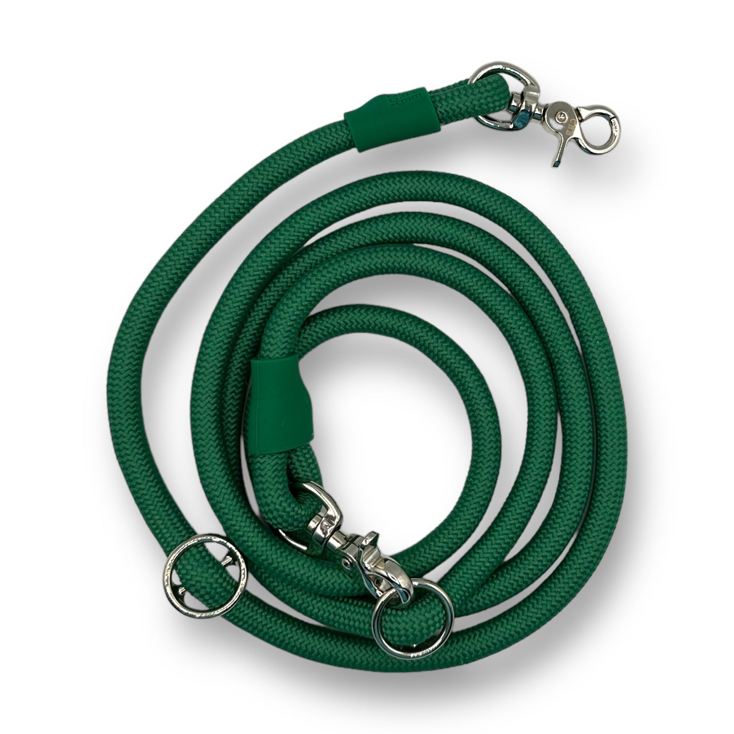Green dog leash with metal clips on a white background