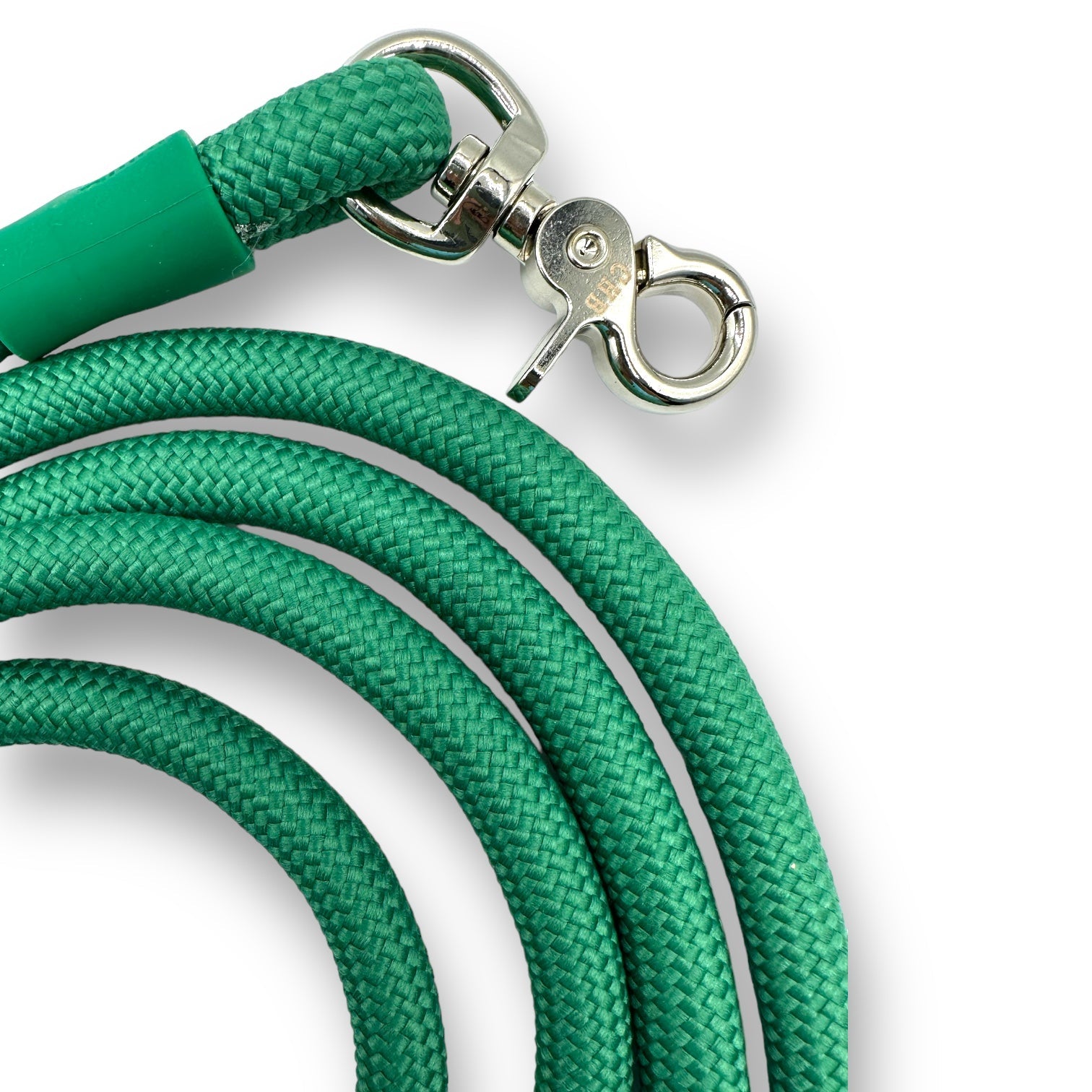 Green rope leash with silver clasp on a white background