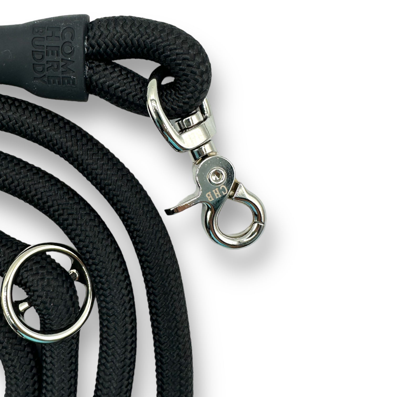 Black dog leash with metal clasp on a white background