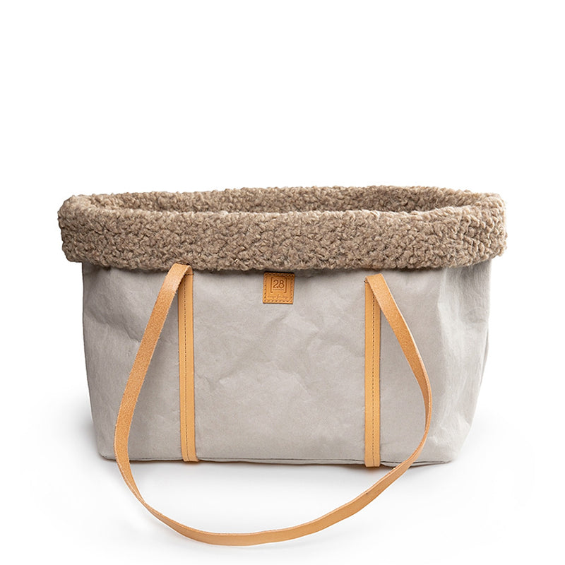 Winter dog carrier bag with warm wool inner lining.