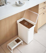 Dog food container lid open