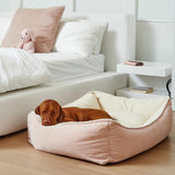Large size dog sleeping in bowsers pet bed