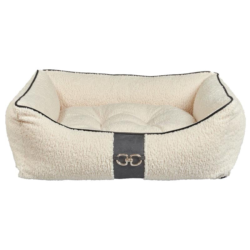 Bowsers sheepskin dog bed in ivory color with high quality fabric cover