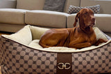 Large breed dog resting on designer pet bed for extra large and giant breeds