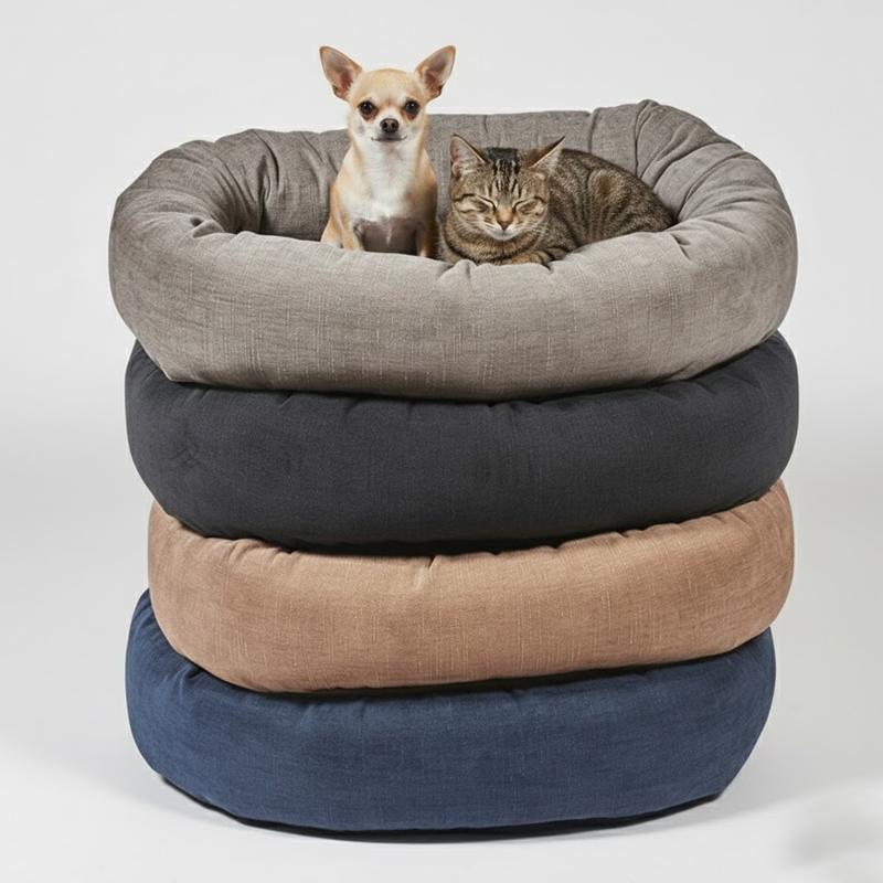 Stack of round cotton pet beds in gray, black, brown, and blue with a dog and cat on top.