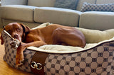 Large size dog sleeping in luxury bowser dog bed