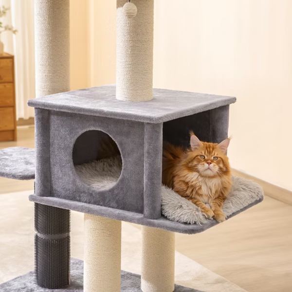 Large orange cat sitting on a gray cat tree with multiple levels and a scratching post.