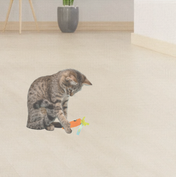 Cat playing with a toy on a light-colored floor.