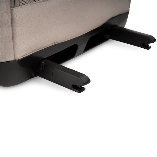 Car seat with a folded footrest on a white background