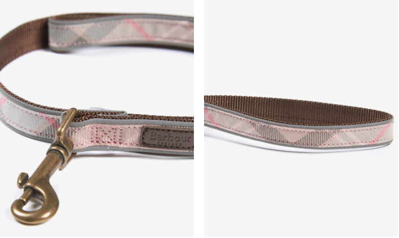 Close up image of stylish Barbour dog leash in pink tartan 