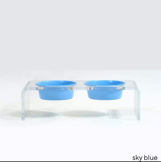 Elevated pet feeder in clear acrylic with blue bowls