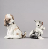 Two porcelain pet figurines from Lladro make the best luxury gift  for a dog mom and cat mom for Mother's Day  gift.