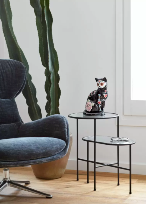 Lladro Catrina figurine in a modern home decor placed on  a side table