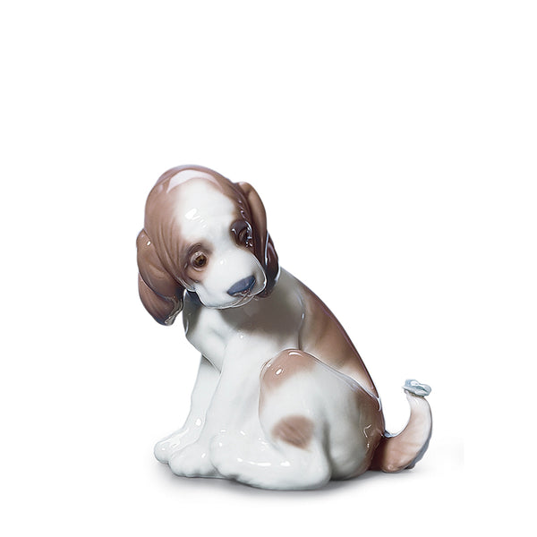 Lladro gentle surprise puppy figurine with butterfly on the dog's tail