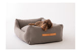 Canvas Henri dog bed 2.8 designs with a terrier dog sleeping