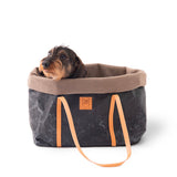 Black color designer dog carrier for small dogs with a dachshund inside.