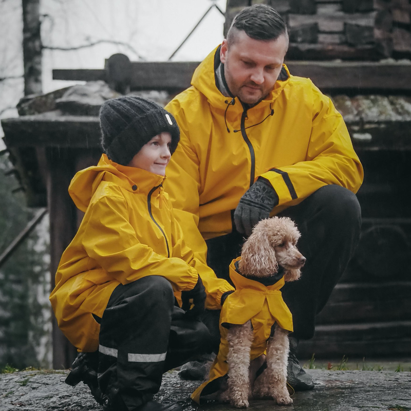 Matching raincoats for dogs and their owners