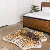 Frenchie sleeping on Puprug dog bed in tiger print